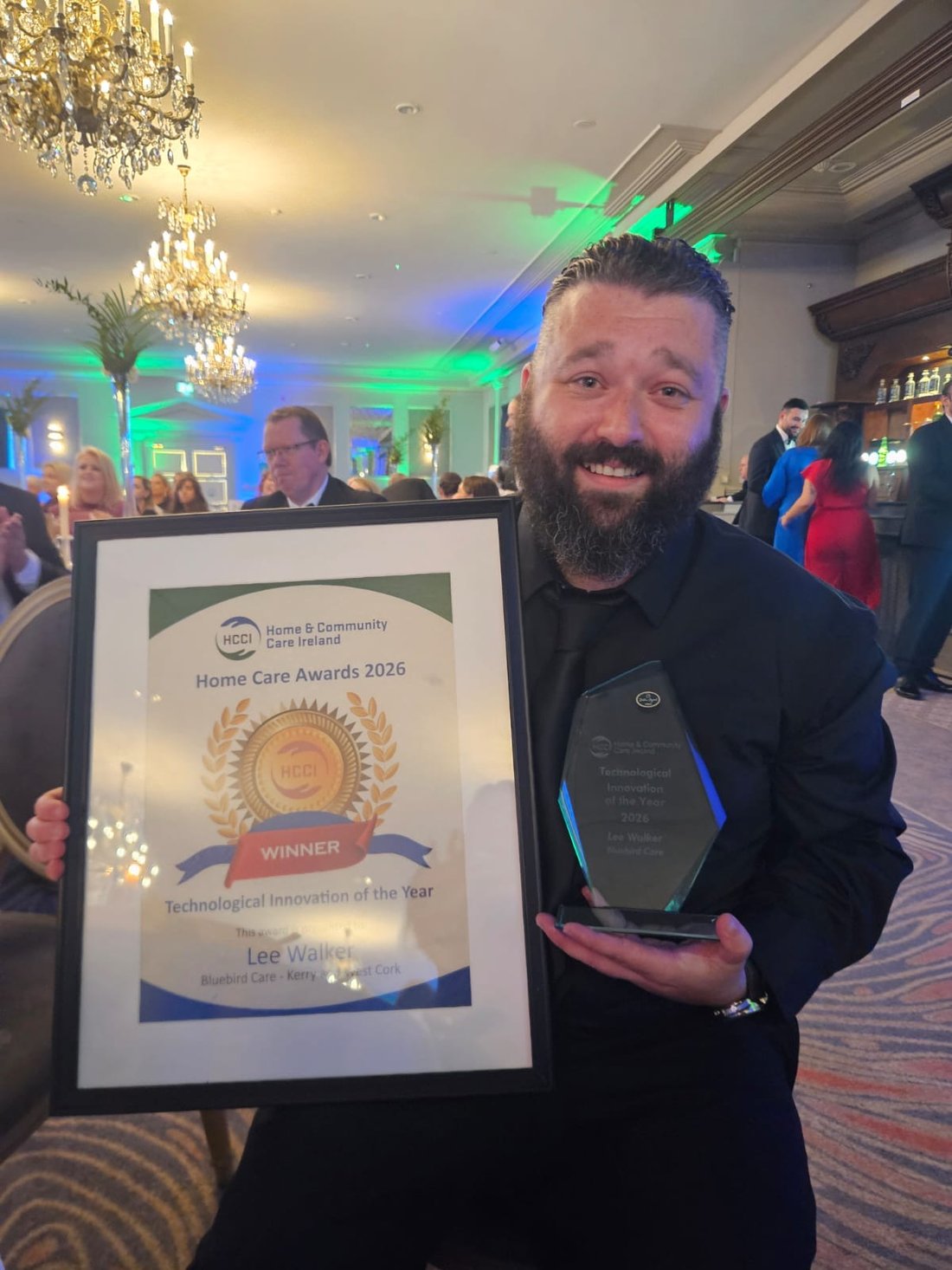 Lee Walker holding the HCCI Technological Innovation of the Year 2026 award